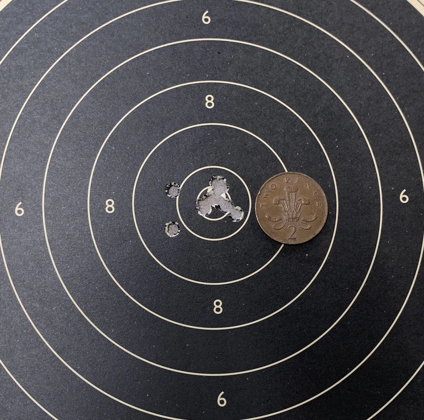 Ten-shot rifle group on a paper target
